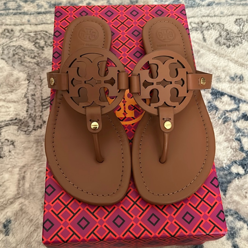 Brown Tory Burch sandals worn only a few times and in good condition with box